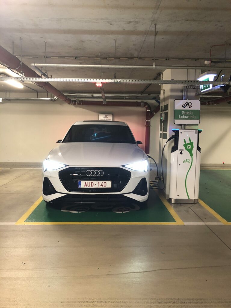 Audi e-tron Sportback charging in a public parking